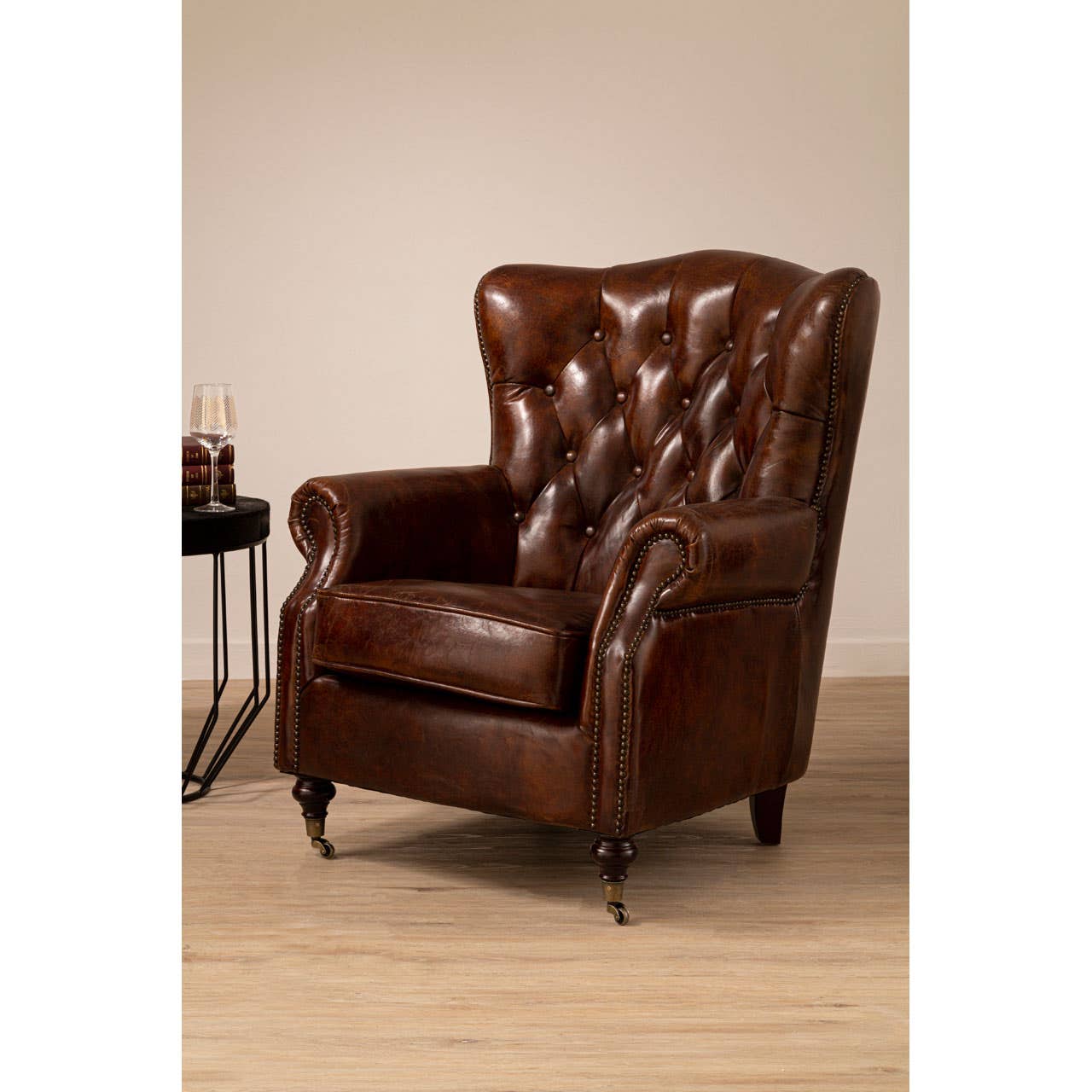 VICTOR BROWN LEATHER SCROLL ARMCHAIR